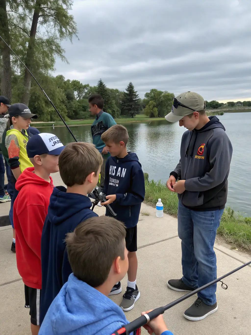 A photo of a training session for young anglers, emphasizing the educational aspect of the organization's activities.
